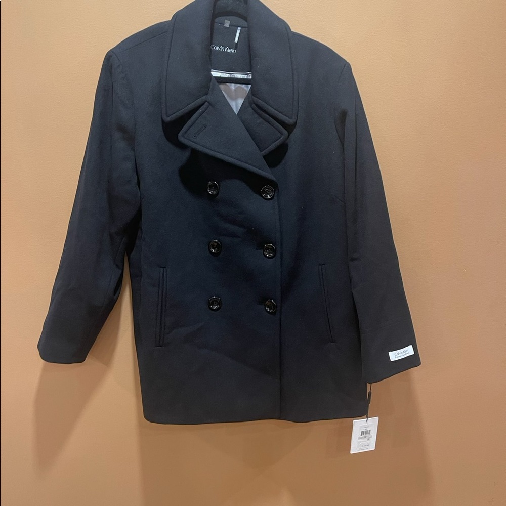 This is a black Calvin Klein peacoat in size 1X never worn before *BRAND NEW*